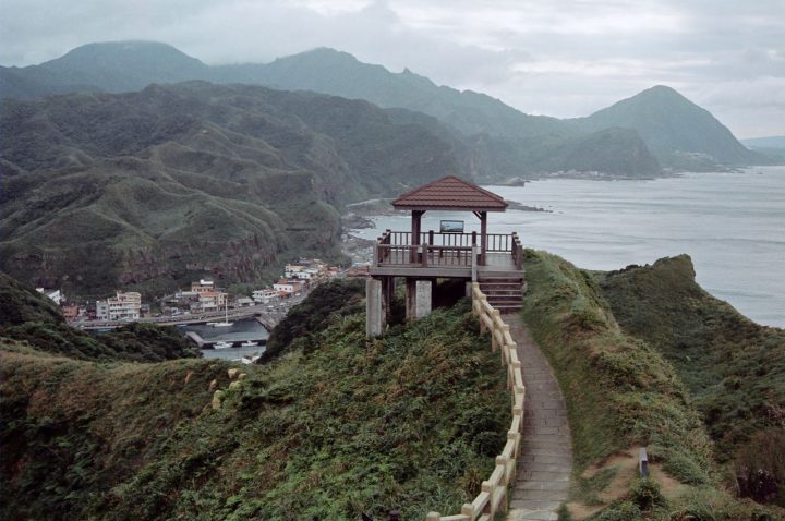gazebo on ridge mountainous background